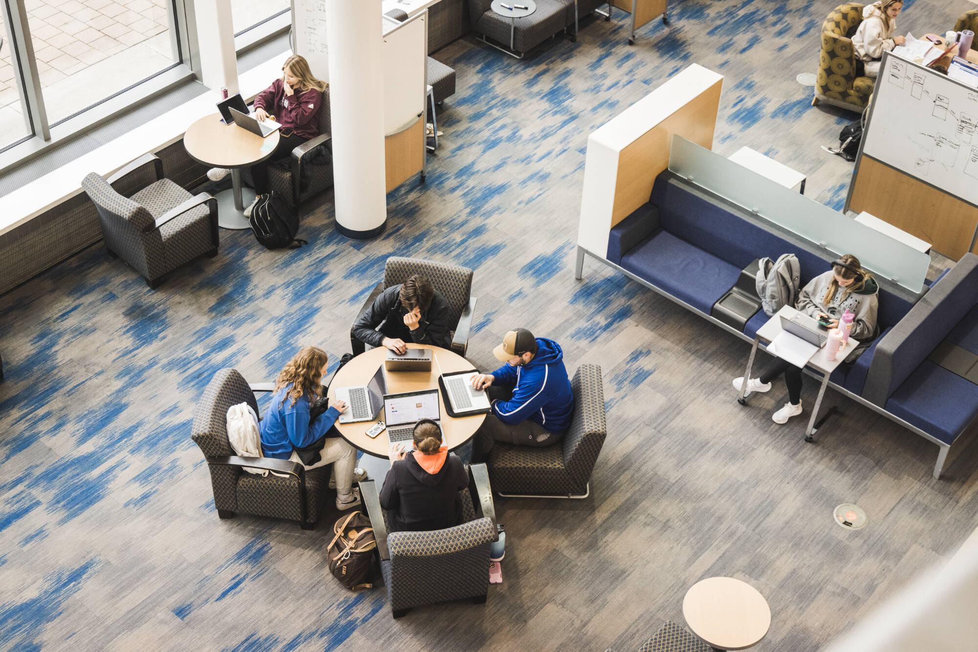 Students sitting around a desk